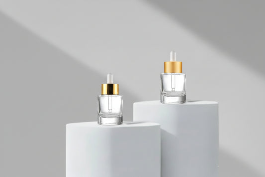30ml Clear Flat Shoulder Heavy Glass Bottle with Golden / Golden Matt Broad Dropper (20mm)
