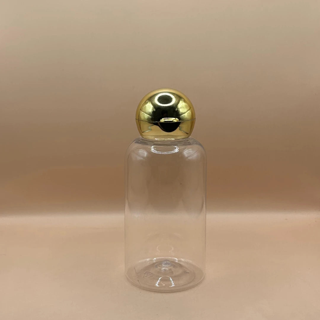 Pet Bottle AP 100ML PET Boston Bottle With 24/410 Dom Flip-Top Cap Golden Coating | Elegant Packaging for Personal Care